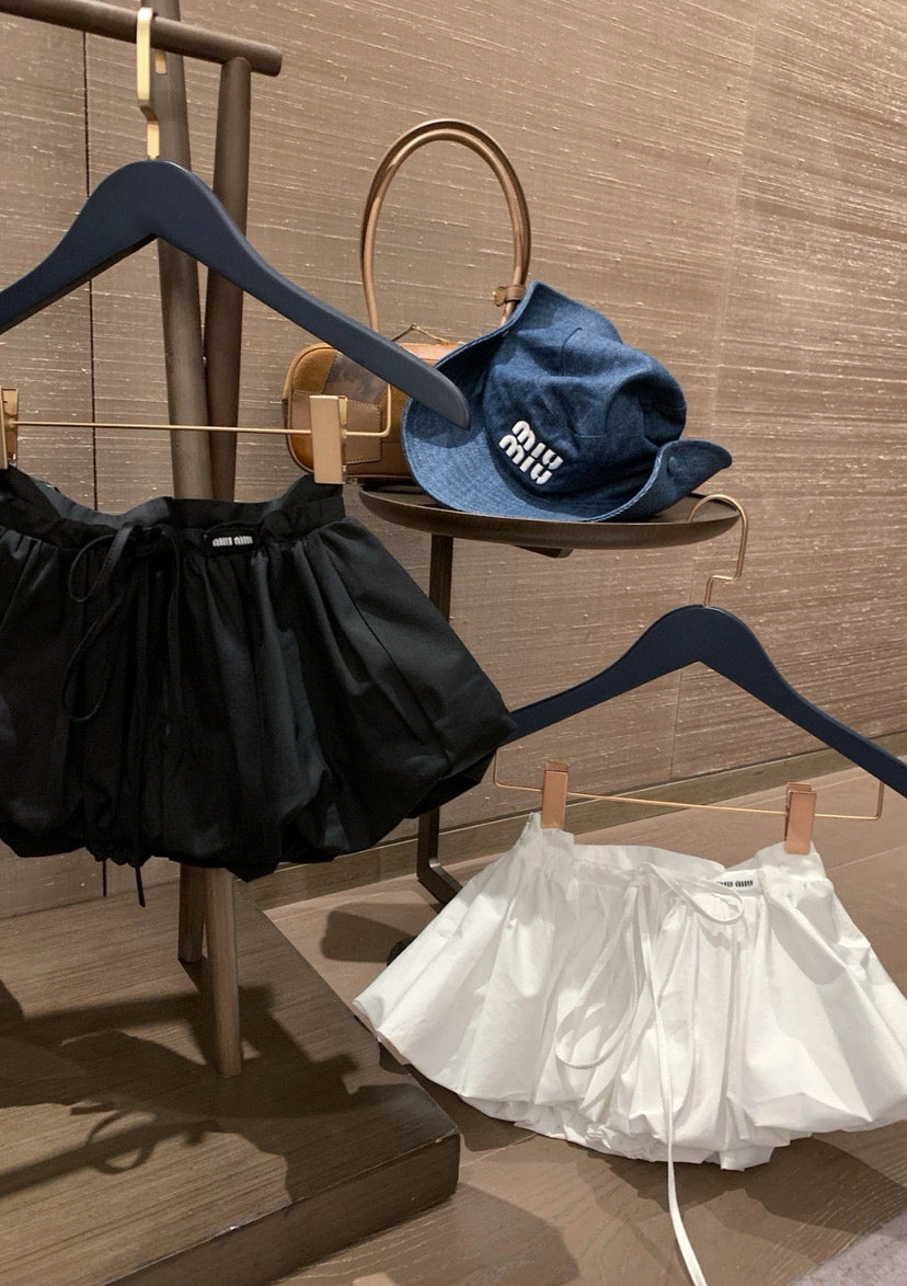 MiuMiu mini puffer skirts