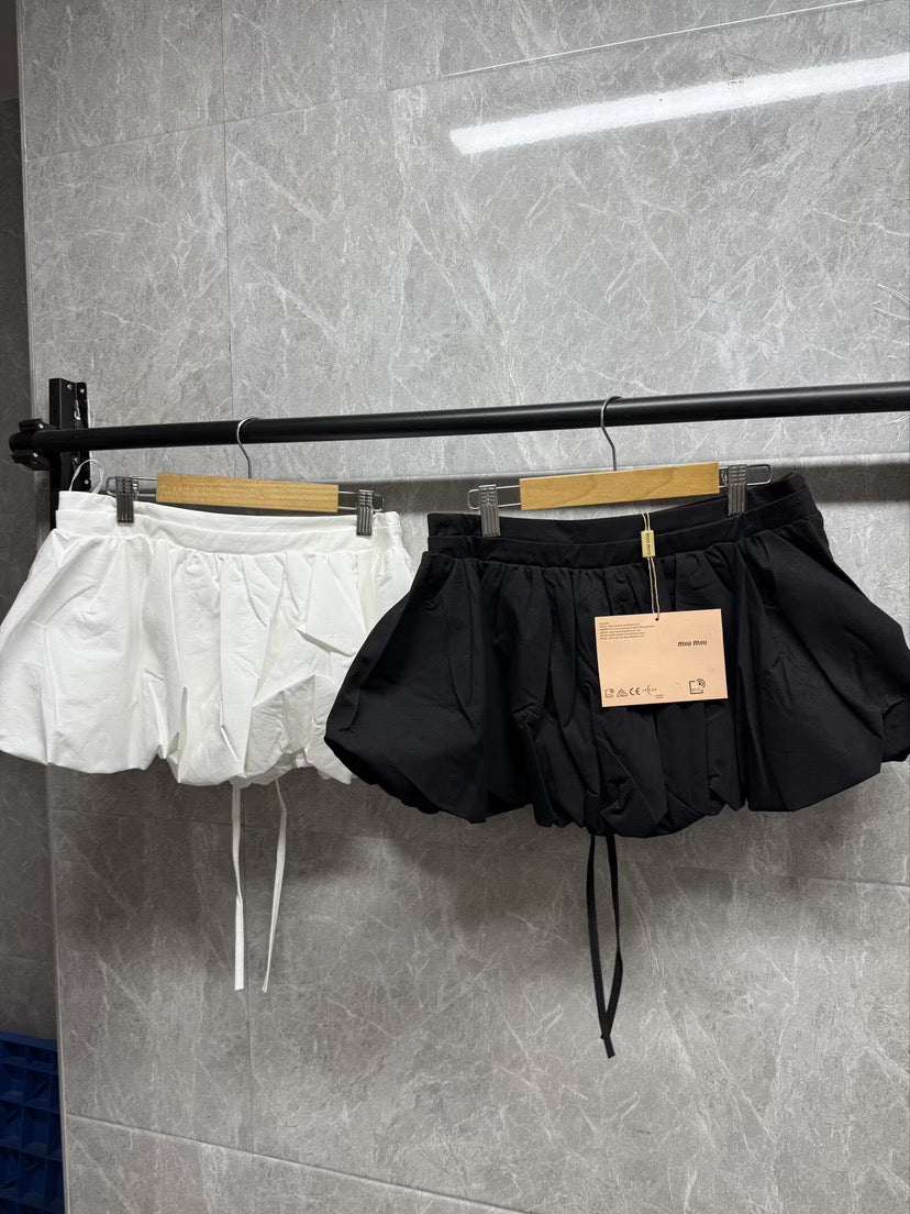 MiuMiu mini puffer skirts